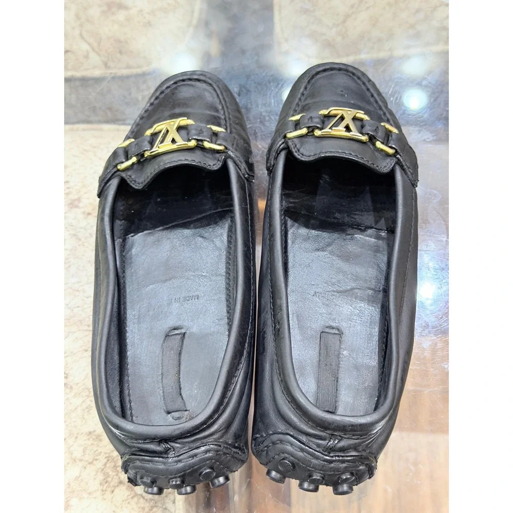 Louis Vuitton Black Leather Loafers Gold LV Logo Driving Shoes Womens Italy 39